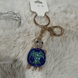 Sparkling Turtle Keychain with Blue and Gold Accents